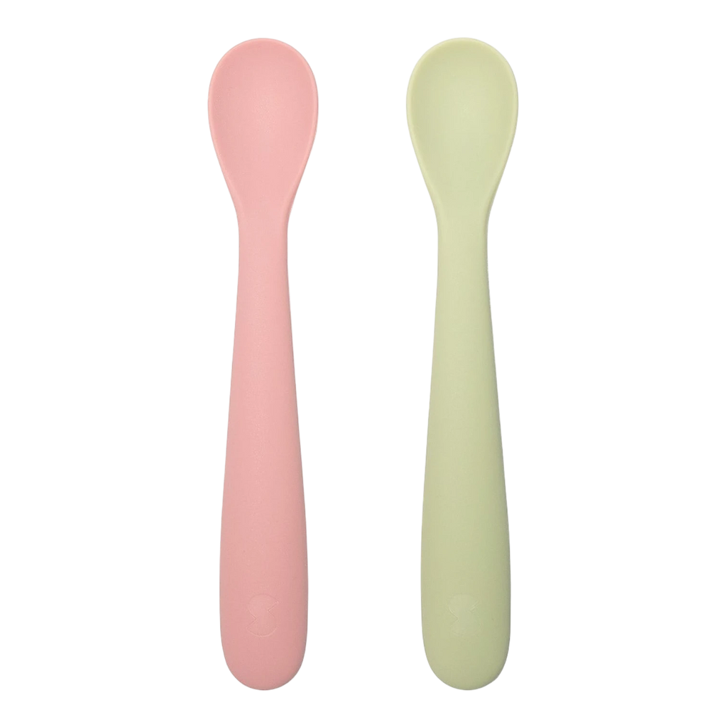 Snapkis Official pink and light green silicone weaning spoons with rounded ends and ergonomic handles.